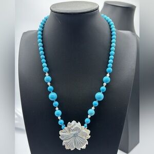 Lee Sands carved Mother Of Pearl Hibiscus flower and gemstone necklace.​